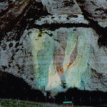 Projection on the White Cliffs of Dover at Samphire Hoe, 2001. This still shows the projection at dusk.